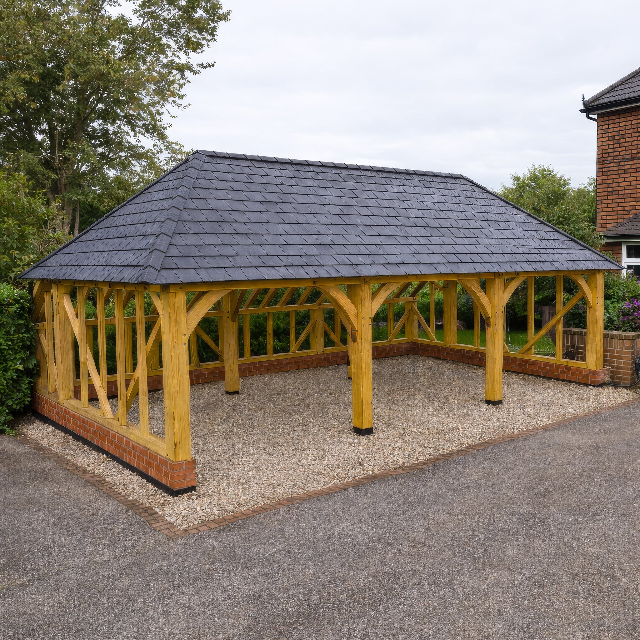 Freestanding Green Oak Framed Triple Bay Garage with Hip Roof - Catslide Extension