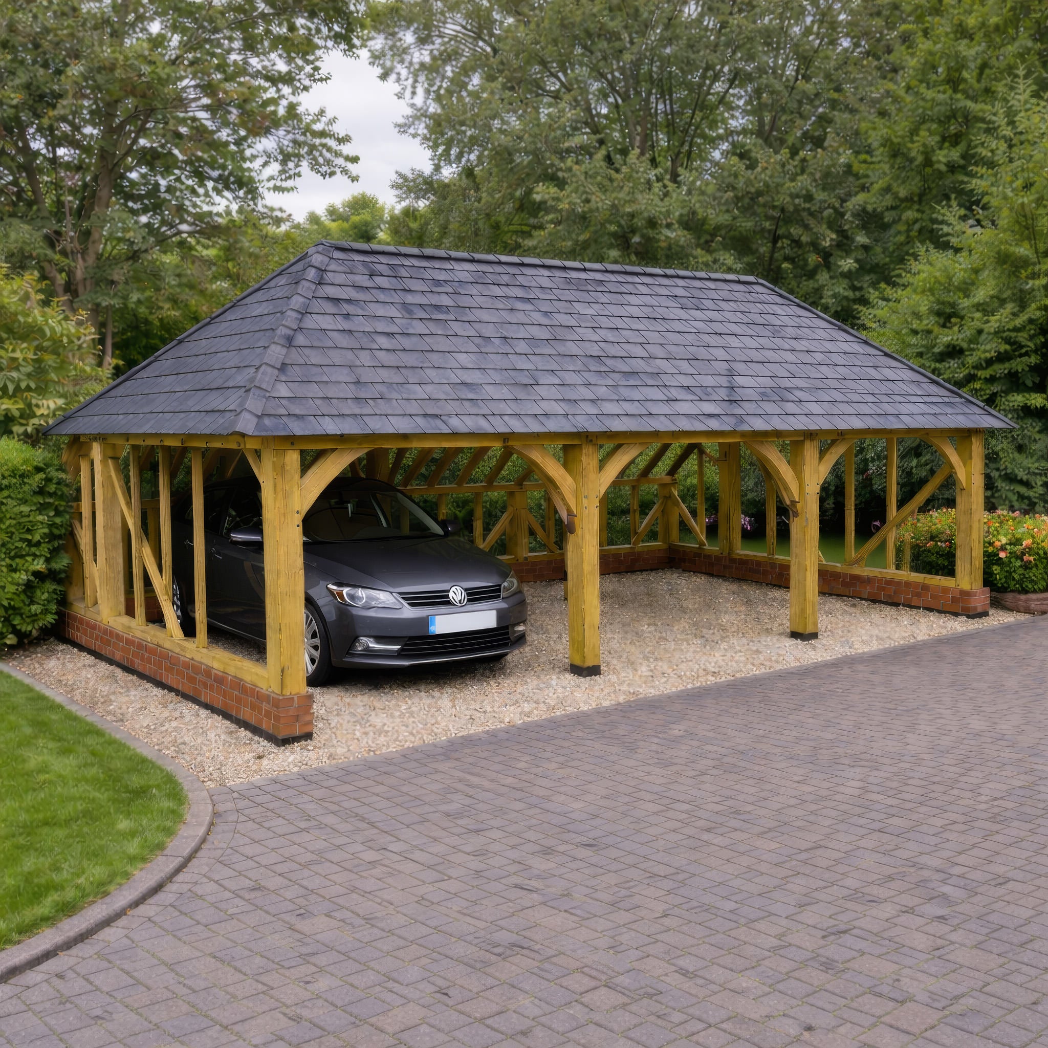 Freestanding Green Oak Framed Triple Bay Garage with Hip Roof - Catslide Extension