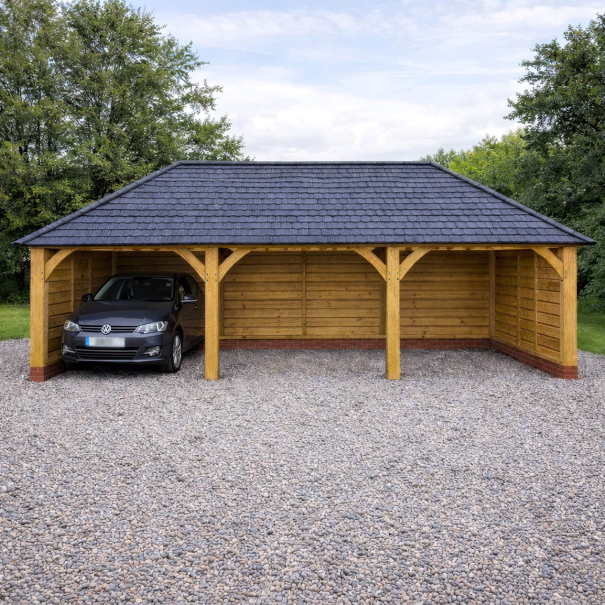 Freestanding Green Oak Framed Triple Bay Garage with Hip Roof - Catslide Extension